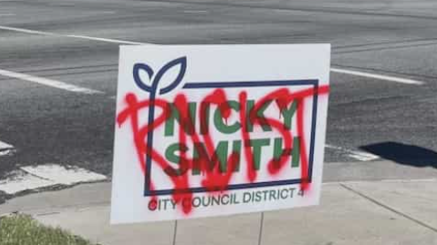 1 charged after 'racist' spray painted on signs of Greensboro City Council candidates